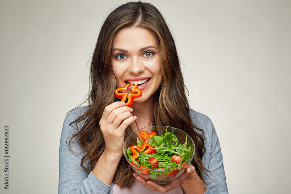 face close up portrait of happy woman eating salad. face close up portrait of happy woman eating salad.