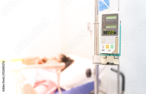 Infusion pump feeding IV drip into patients