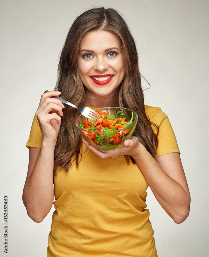 healthy life style with smiling woman eating vegetarian salad. healthy life style with smiling woman eating vegetarian salad.