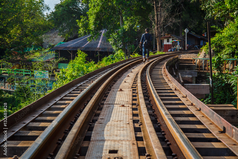 Fototapeta premium Railroad track curve around a bend in thailand