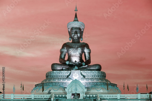 Abstract color of Large outdoor Phra Phuttha Maha Thammaracha Buddha. photo