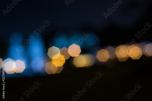 Colorful abstract bokeh background at the night © karnmanic