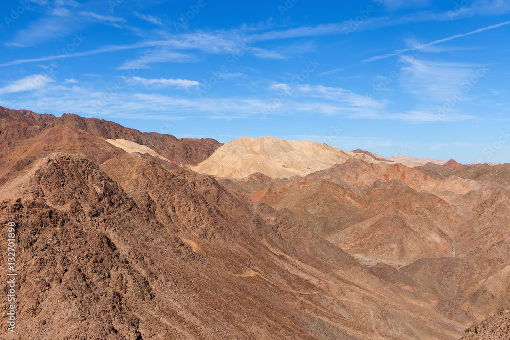 Desert mountains with blue sky in the background Desert mountains with blue sky in the background