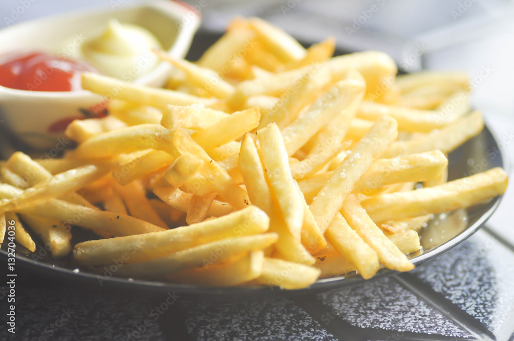 French fries with ketchup and mayonnaise French fries with ketchup and mayonnaise