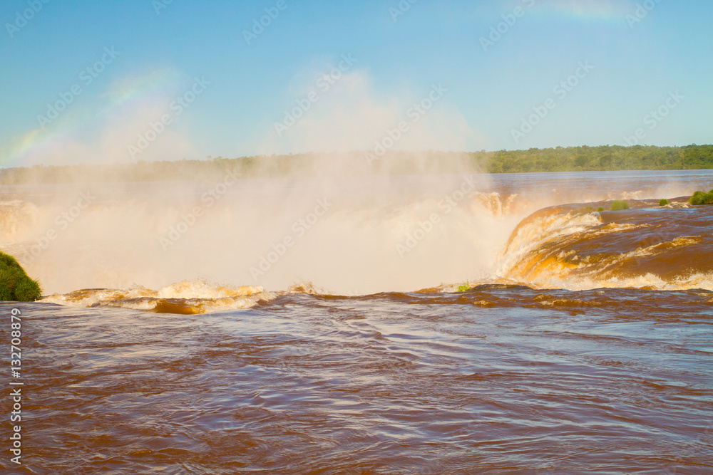 View of the Iguazu (Iguacu) falls, the largest series of waterfalls on the planet, located between Brazil, Argentina, and Paraguay. View of the Iguazu (Iguacu) falls, the largest series of waterfalls on the planet, located between Brazil, Argentina, and Paraguay.