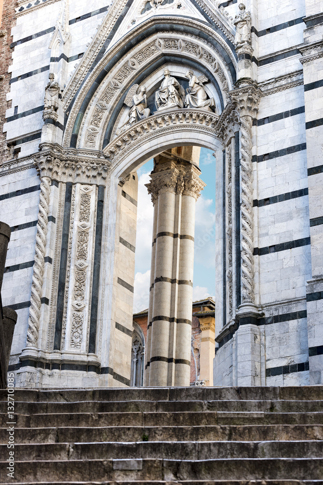 Siena Cathedral. Archway, entrance to the cathedral square. Tuscany, Italy