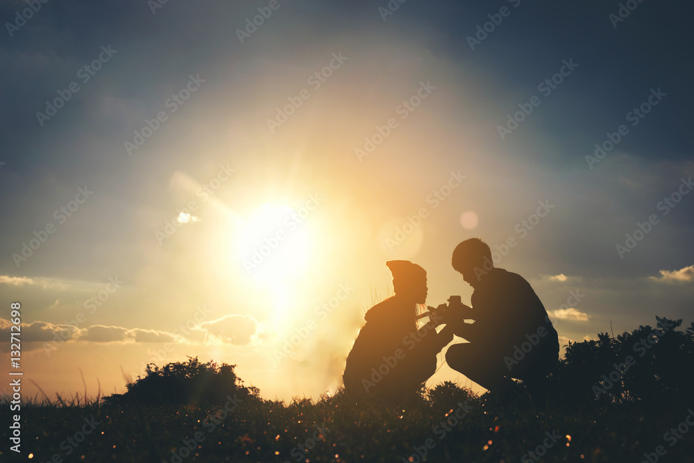 Couple in love enjoying tender moments during sunset Couple in love enjoying tender moments during sunset