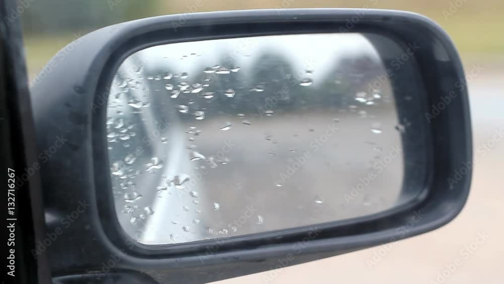 Car Side Mirror View With Water Rain Drops Car Side Mirror View With Water Rain Drops