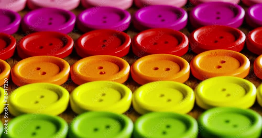 roundup of buttons colorful couture, buttons of all high-fashion colors to sew on clothing. concept of color, fashion, dressmaking, sewing, tailor. roundup of buttons colorful couture, buttons of all high-fashion colors to sew on clothing. concept of color, fashion, dressmaking, sewing, tailor.