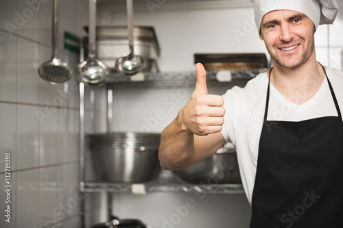 Happy chef showing thumb up