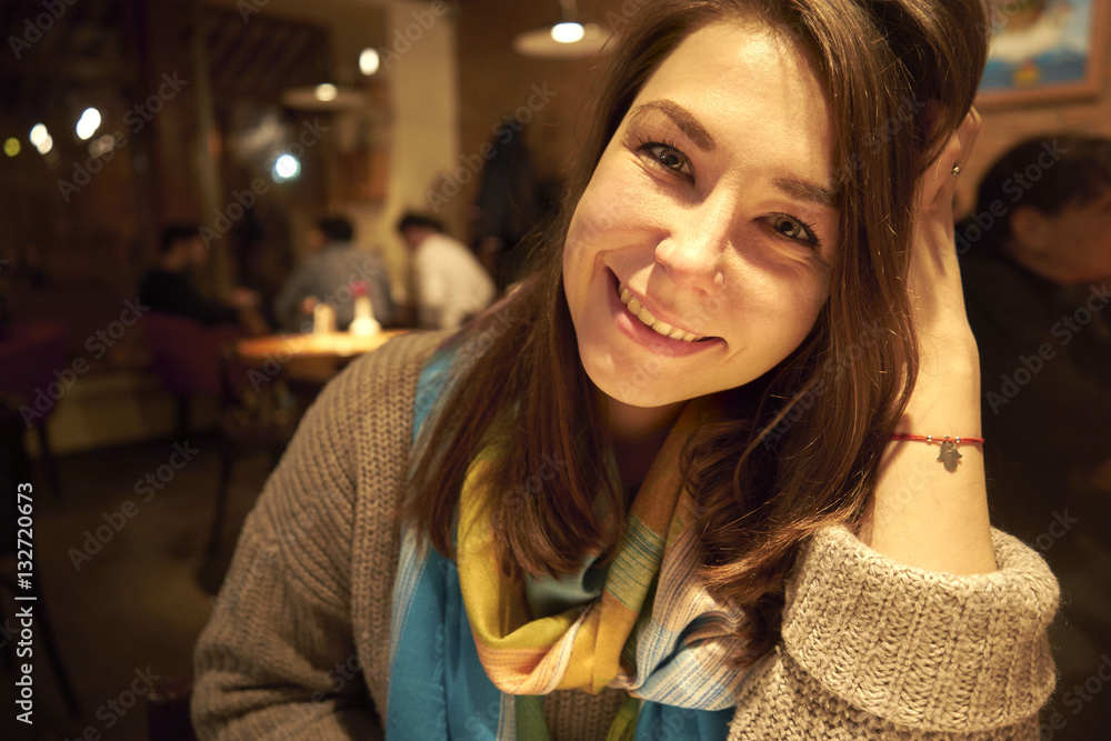 Beauty woman with perfect smile looking at camera at home Beauty woman with perfect smile looking at camera at home