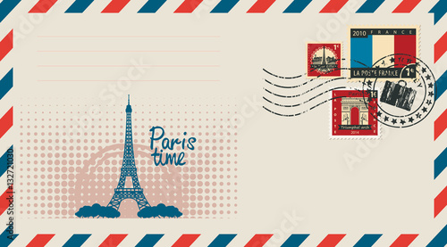 an envelope with a postage stamp with Arc de Triomphe, the Eiffel tower and the flag of France