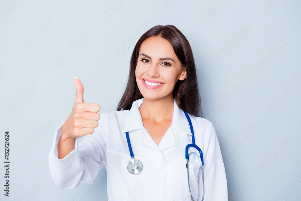 Portrait of happy cheerful toothy doc gesturing like Portrait of happy cheerful toothy doc gesturing like