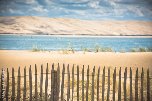 Wooden fence on Atlantic beach in France