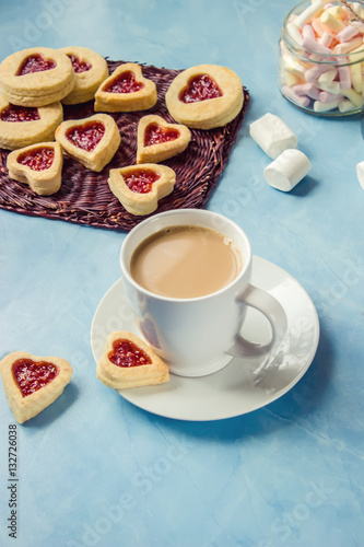 cocoa with marshmallows and a cookie heart. Selective focus.  photo