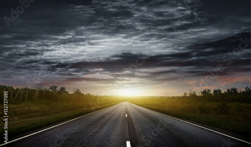 Country road with a dark sky © Vitaly Krivosheev