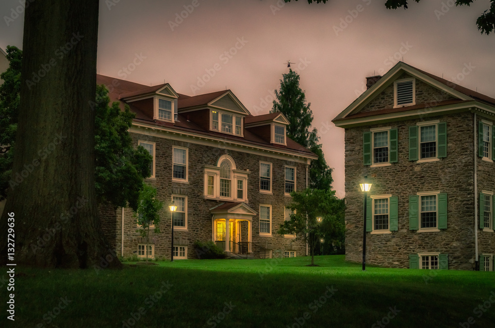 PHILADELPHIA, Buildings of Germantown district. Germantown was the birthplace of the American antislavery movement, the site of a Revolutionary War battle. Low light vivid image.