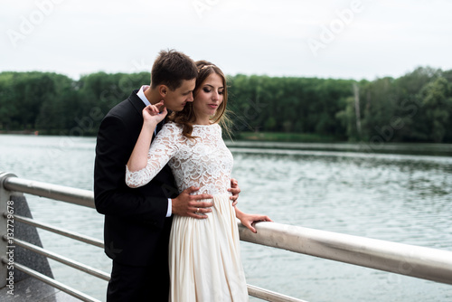 happy bride and groom at a park on their wedding day