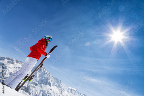 Beautiful brunette woman with ski