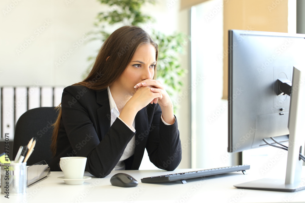 Businesswoman solving a difficult assignment