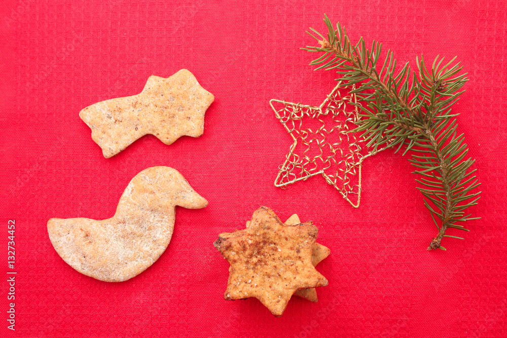 Christmas cookies and decorations on red background Christmas cookies and decorations on red background