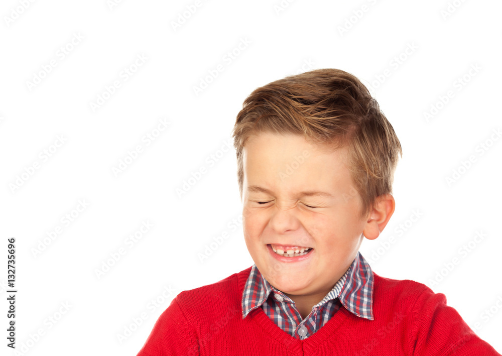 Blond child with a funny expression closing his eyes Blond child with a funny expression closing his eyes