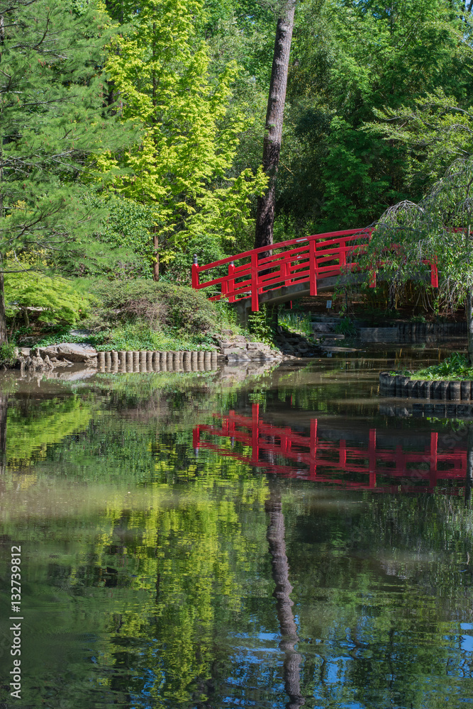 Duke Garden's Japanese garden.  Red bridge over water.  Tranquility and peace.  Calm. 