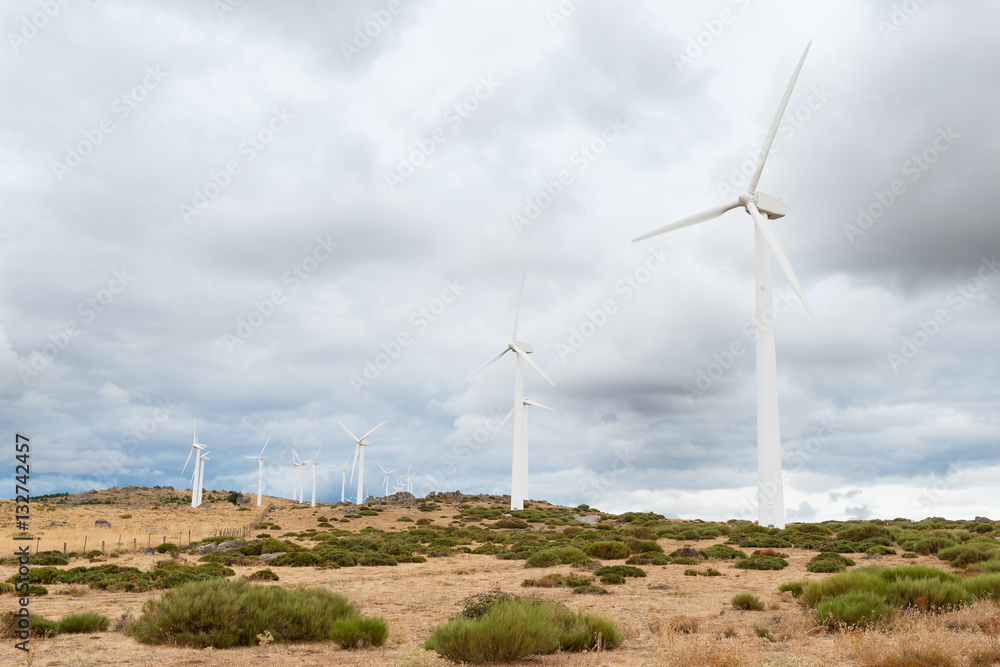 power plant with wind turbines in open field background power plant with wind turbines in open field background