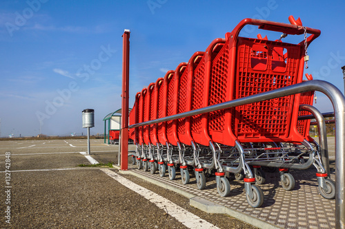 Fotografija Wheel of Shopping carts on a parking lot