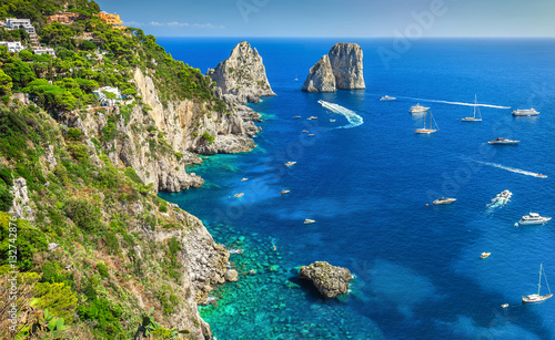 Stunning Capri island, beach and Faraglioni cliffs, Italy, Europe © janoka82