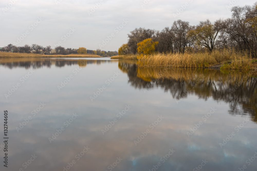 Morning autumnal landscape on a Chaplinka river in Zarytschanka urban settlement, Ukraine