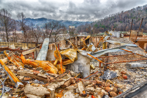 GATLINBURG, TN/USA - December 14, 2016: A motel complex lies in ruins after a major forest fire roared through Gatlinburg and a large section of the Smoky Mountains in late December 2016.