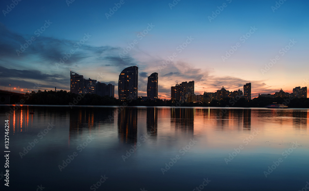 Cityscape: Moscow brindge and Obolon district in the evening. Kiev. Ukraine. East Europe