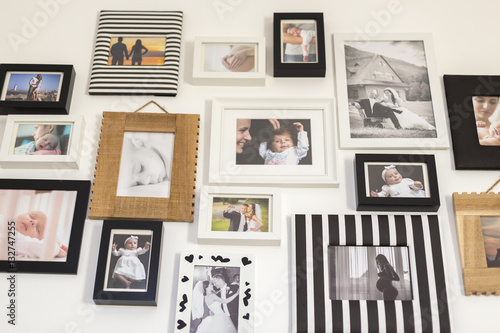 photos of the family in various photo frames