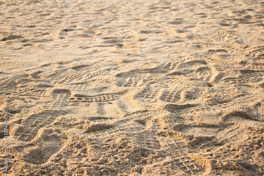 Fototapeta premium Footprint on the sand (selective focus)