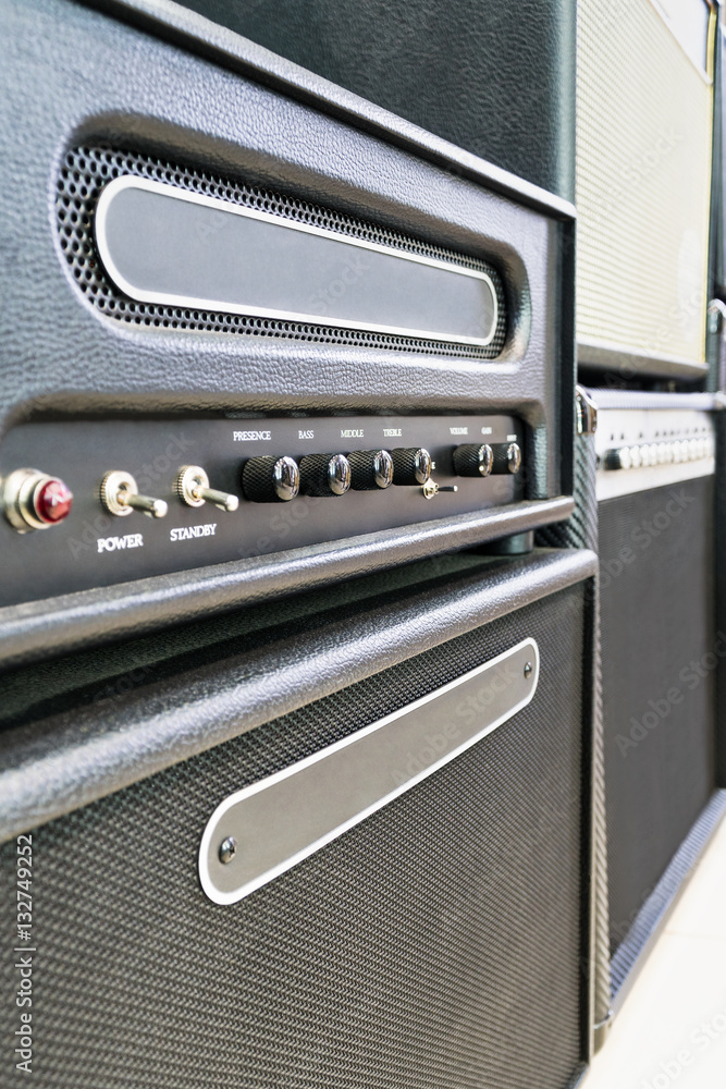 Musical equipment. Several speakers with a control unit with toggle switches and adjusting knobs Musical equipment. Several speakers with a control unit with toggle switches and adjusting knobs