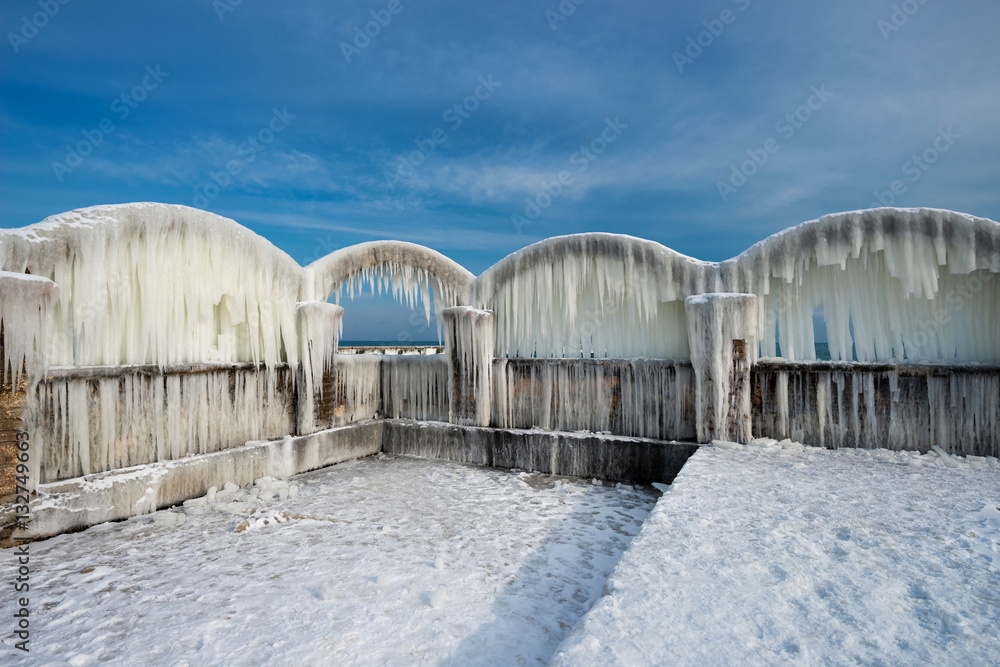 Icicles over the arches of the abandoned swimming pool by the sea Icicles over the arches of the abandoned swimming pool by the sea
