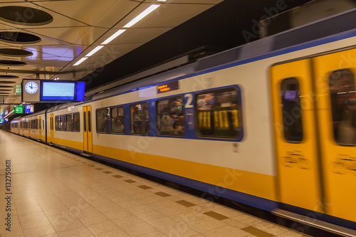 Train moving out from subway station in The Netherlands