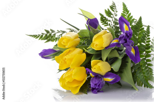 Fototapeta Naklejka Na Ścianę i Meble -  bunch of yellow tulips and blue irises on white background