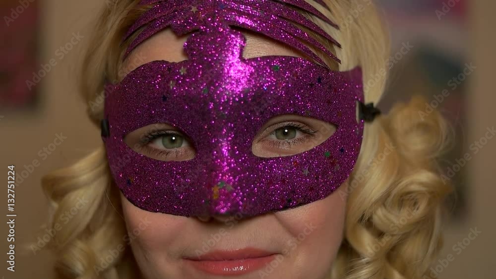 beautiful girl in carnival mask