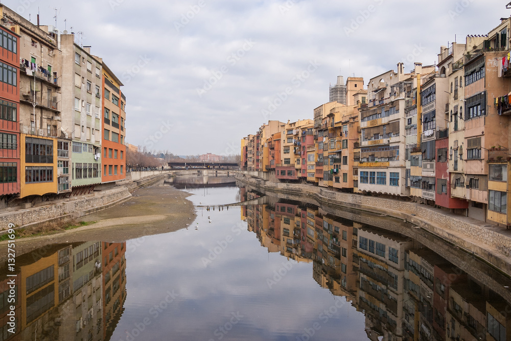 Reflection of fascades of the city of Girona, Spain