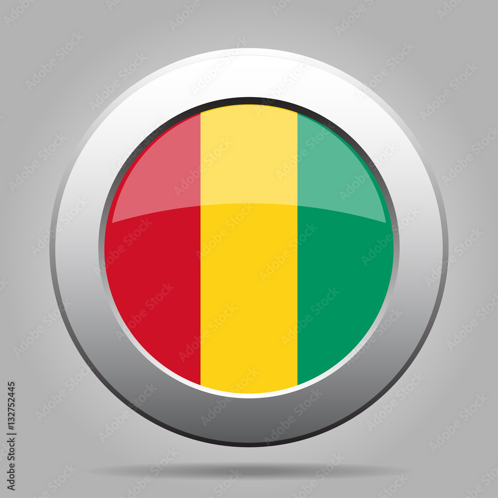 Fototapeta premium Flag of Guinea. Shiny metal gray round button.