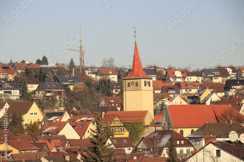 Blick auf Weissach im Landkreis Böblingen mit seinem historischen Kirchturm photo