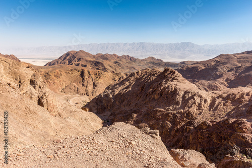 Desert canyon mountains rock cliffs gorge, Negev travel Israel. © subbotsky