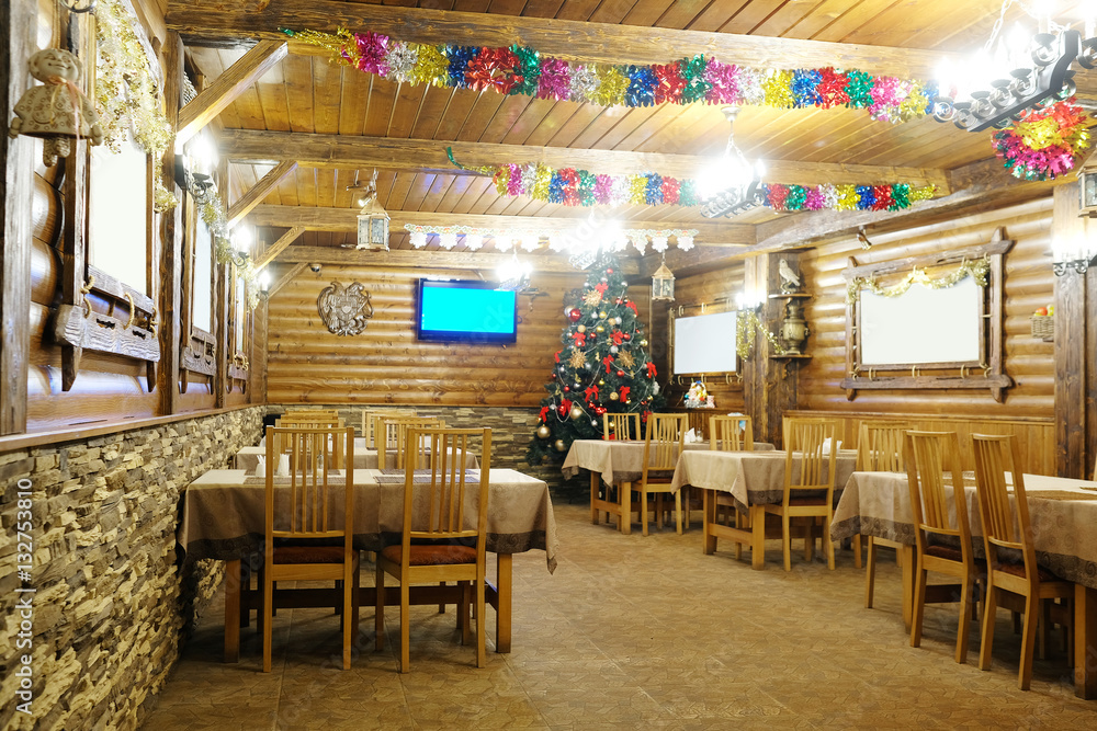 Fototapeta premium Interior of a cafe in a wooden house