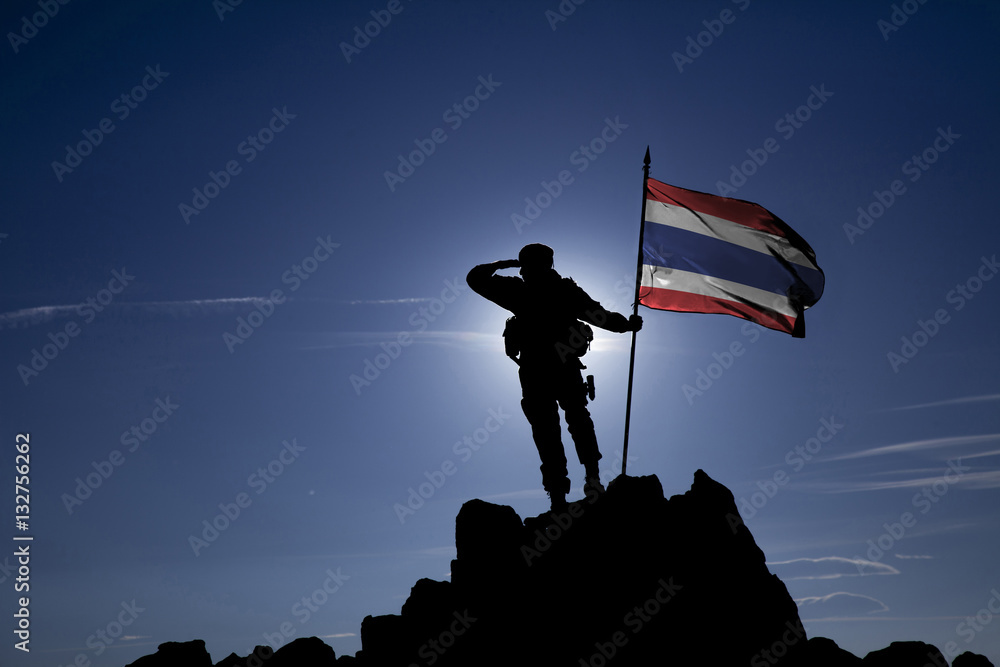 Soldier on top of the mountain with the Thai flag