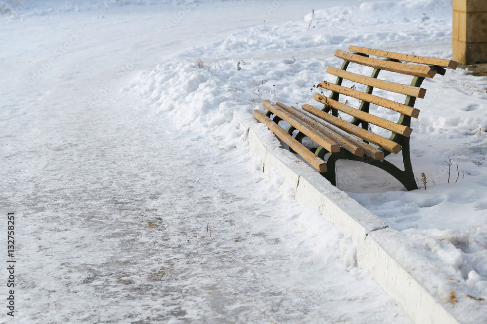 old bench on a snow winter backgrounds