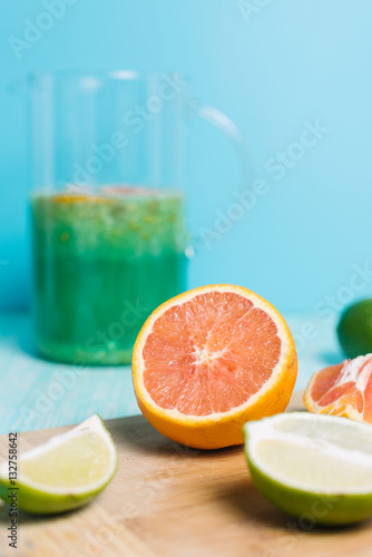 Fototapeta Naklejka Na Ścianę i Meble -  Citrus fruits. Oranges, limes and lemons. Set of sliced citrus on wooden table, background with copy space
