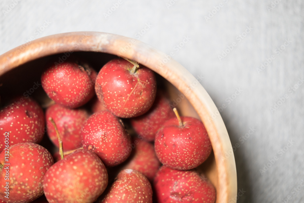 maybush in wooden bowl