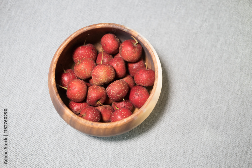 maybush in wooden bowl